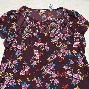Women size M floral blouse. Brand new!